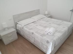 Katil atau katil-katil dalam bilik di Ariel e Giangy Home