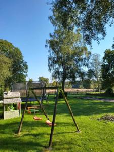 Ο χώρος παιχνιδιού για παιδιά στο Spacious family house in Haut-Fays, 250 m² with garden