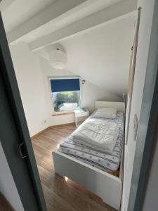 Postel nebo postele na pokoji v ubytování Appartement à Arradon