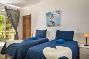 Postel nebo postele na pokoji v ubytování KITE BEACH HOTEL Oceanfront Apartments + 37 fotografií