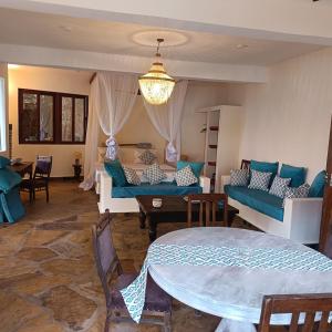 O zonă de relaxare la Green Deluxe Cottage