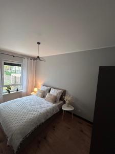 Ένα ή περισσότερα κρεβάτια σε δωμάτιο στο Loft Apartament Grudziądz
