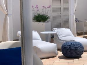 A seating area at Bettola del Re home boutique b&b