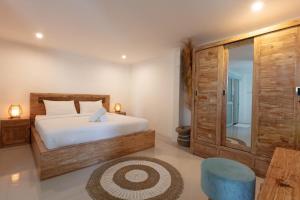 Braban Sari Bali房間的床