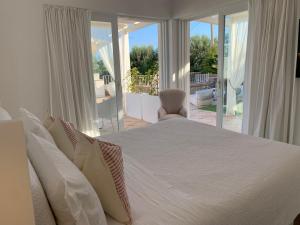 A bed or beds in a room at Bettola del Re home boutique b&b