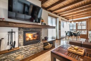 A television and/or entertainment centre at Colomers by Totiaran