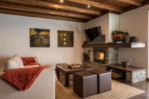 A seating area at Colomers by Totiaran