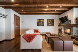 A television and/or entertainment centre at Colomers by Totiaran