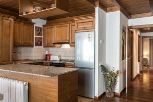 A kitchen or kitchenette at Colomers by Totiaran