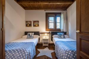A bed or beds in a room at Colomers by Totiaran