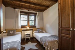 A bed or beds in a room at Colomers by Totiaran