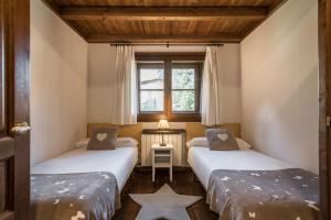A bed or beds in a room at Colomers by Totiaran