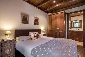 A bed or beds in a room at Colomers by Totiaran