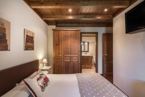 A bed or beds in a room at Colomers by Totiaran