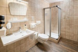 Kúpeľňa v ubytovaní Hotel Standlhof Zillertal