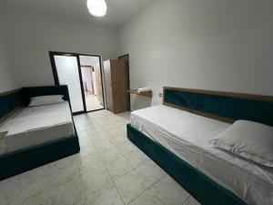 Postel nebo postele na pokoji v ubytování Sisterhood Hostel-Female Only + 11 fotografií