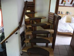 Postel nebo postele na pokoji v ubytování Gemütliches Haus im Feriendorf Silbersee + 1 fotografie