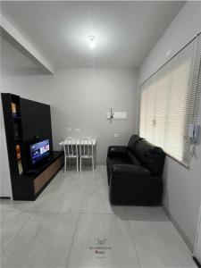 TV a/nebo společenská místnost v ubytování Residencial Yama