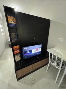 TV a/nebo společenská místnost v ubytování Residencial Yama