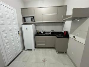 Kuchyň nebo kuchyňský kout v ubytování Residencial Yama