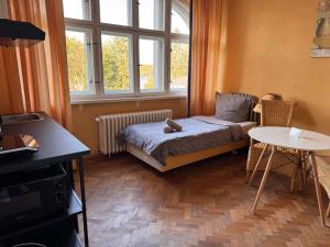 Postel nebo postele na pokoji v ubytování Villa am Peetzsee