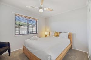 Ένα ή περισσότερα κρεβάτια σε δωμάτιο στο Highgrove Retreat