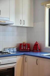 Η κουζίνα ή μικρή κουζίνα στο Highgrove Retreat