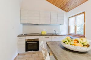 A kitchen or kitchenette at La Mansarda di nonna Delfa