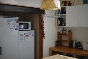 Köök või kööginurk majutusasutuses Chambre Bugrane