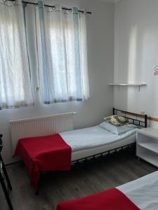 Posteľ alebo postele v izbe v ubytovaní Arcus Premium Hostel