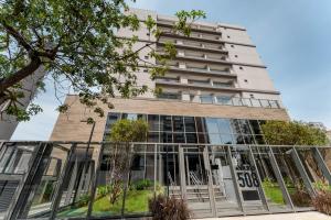 圣保罗Apartamentos Studio Allure Moema - Com café da manhã opcional, Recepção e Valet 24 horas的大楼的外部景观