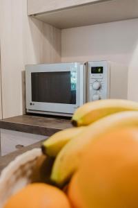 A kitchen or kitchenette at La Mansarda di nonna Delfa