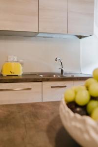 A kitchen or kitchenette at La Mansarda di nonna Delfa