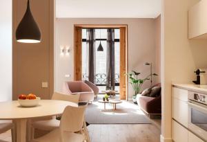 A kitchen or kitchenette at DestinationBCN Universitat Apartments