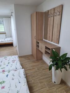 Letto o letti in una camera di Ubytování U Křivánků 2