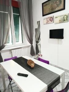 Μια τηλεόραση ή/και κέντρο ψυχαγωγίας στο Casa vacanze completa di tutto e anche di più