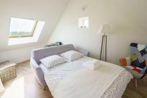 Postel nebo postele na pokoji v ubytování La Maison des Vergers