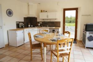 Kuchyň nebo kuchyňský kout v ubytování La Maison des Vergers