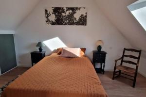 Postel nebo postele na pokoji v ubytování La Maison d'Adèle