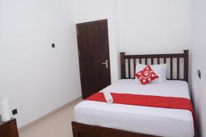 Postel nebo postele na pokoji v ubytování Sea View Tourist Inn