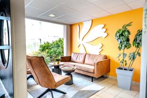 Zona d'estar a Première Classe Roissy - Aéroport CDG - Le Mesnil-Amelot
