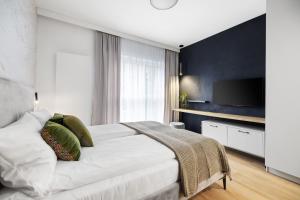 Aparthotel City Break Plac Wolności 6客房内的一张或多张床位