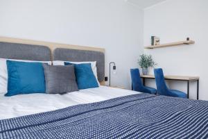 Aparthotel City Break Plac Wolności 6客房内的一张或多张床位