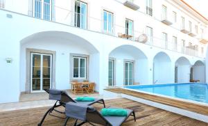 Kolam renang di atau dekat dengan Maison Faro Luxe - A Tranquil Retreat by the Algarve Coast