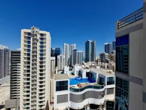 a view of a city skyline with tall buildings at Aspire TowerTwo Bedroom Pilot Paradise in Manama