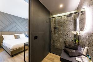 MH SUITES Plebiscito的一间浴室