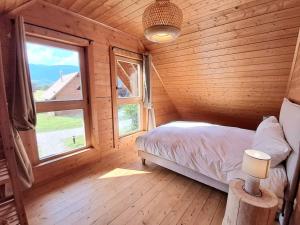 Postel nebo postele na pokoji v ubytování Domaine la Clairière