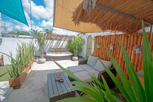 Zahrada ubytování Bungalow Maya en CASA NOMIS CANCUN + 21 fotografií
