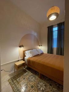 Ένα ή περισσότερα κρεβάτια σε δωμάτιο στο Chic and classic apartment in Santurce Apt 5