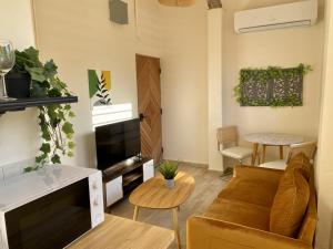 Posezení v ubytování Chic and Centrally Located Apartment in Santurce with parking Apt 4